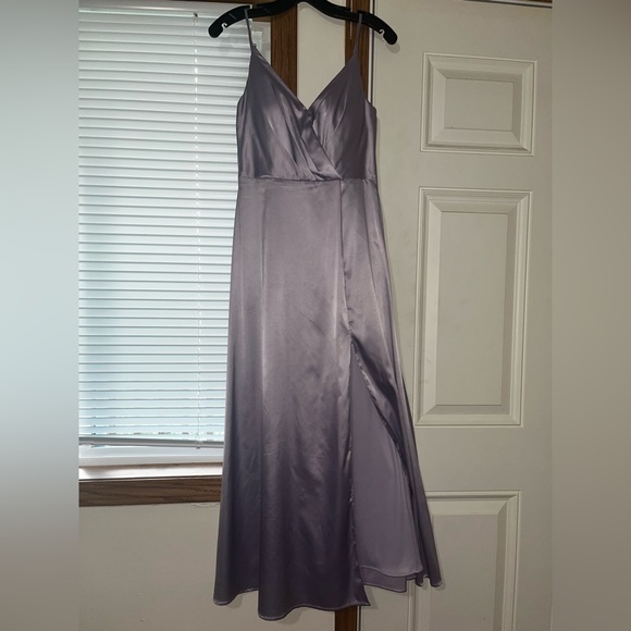 Bridesmaids dress wore once
It is altered to ankle length, size 2 - Picture 1 of 3
